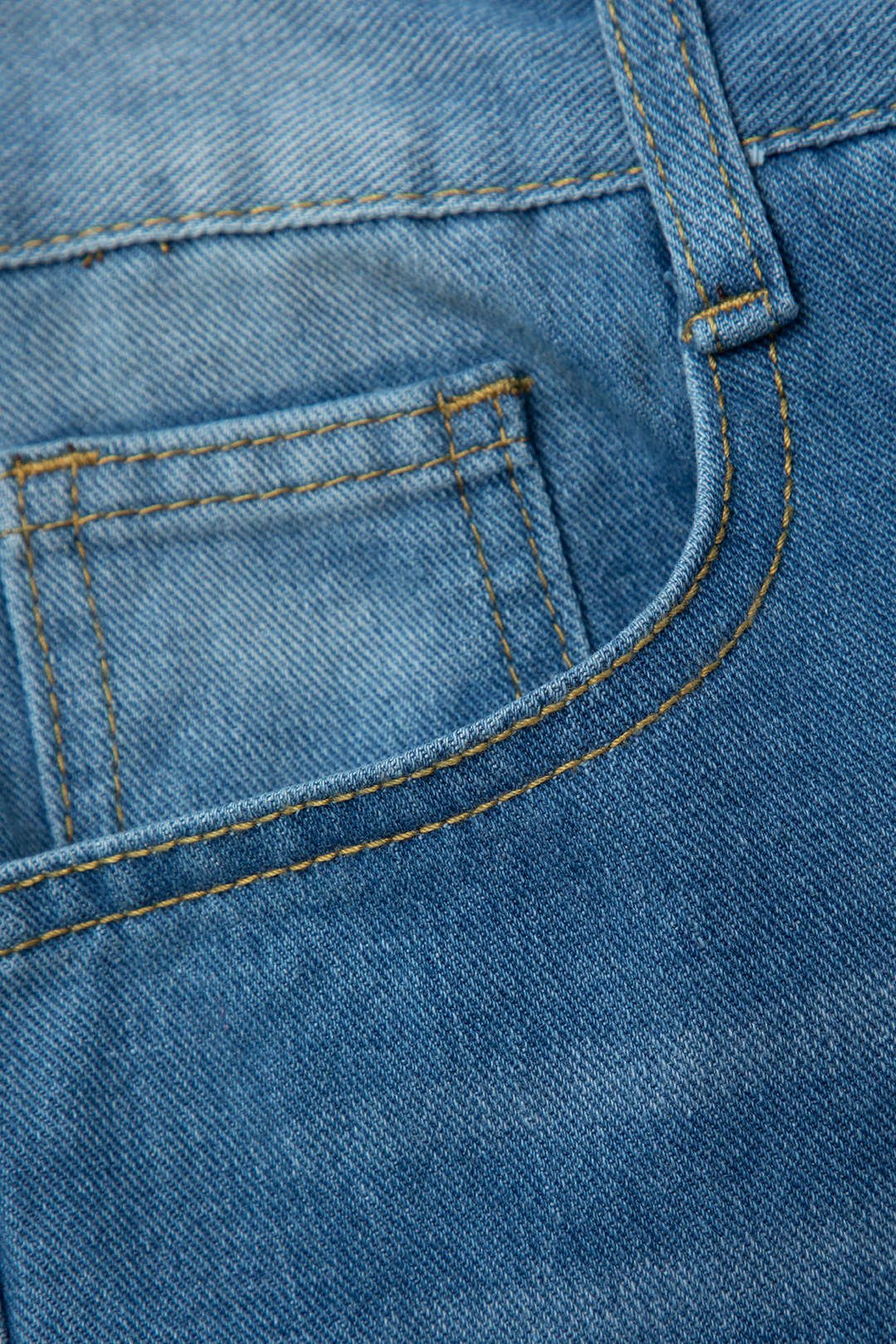 Dames Minimalistische gescheurde jeans met hoge taille